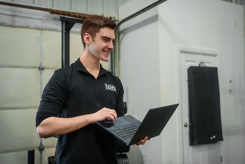 Dane Reus reviewing a client program in the iON app