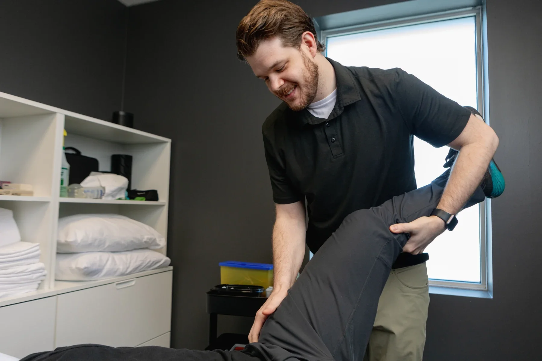 Cole providing hands-on chiropractic care at iON in Guelph